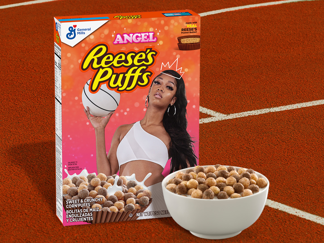 REESE'S PUFFS cereal box featuring all-star Angel Reese